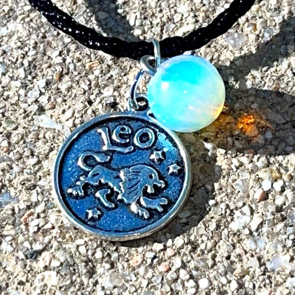 LEO IRON ZODIAC AND MOONSTONE PLANET CHARM BLACK SILK CORD NECKLACE